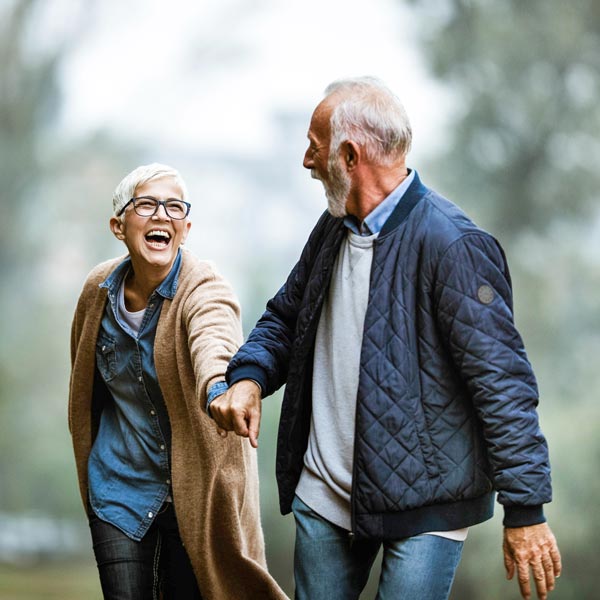 laughing couple on walk