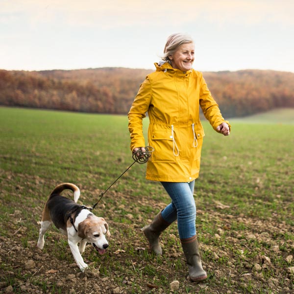 woman walking dog