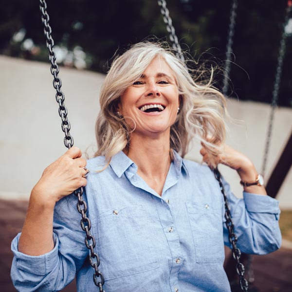 senior woman on swing